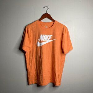 Orange and white Nike Tee size large made in Nicaragua